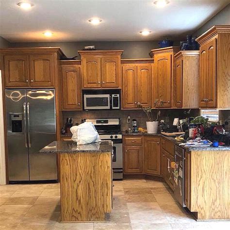 steel grey leathered with honey oak cabinets|honey oak cabinets colors.